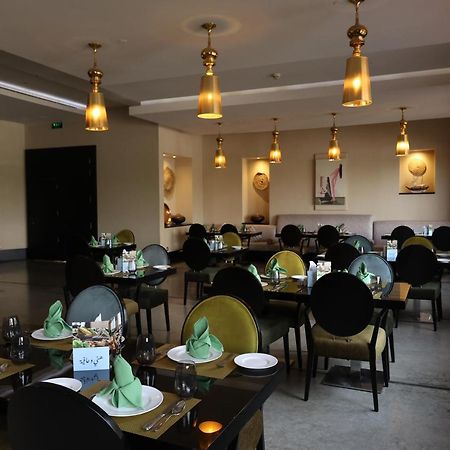 Safir Fintas Hotel Kuwait Кувейт Экстерьер фото Restaurant in Kigali