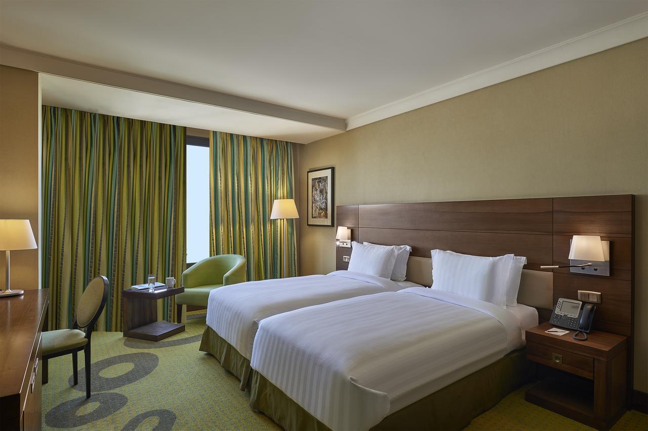 Safir Fintas Hotel Kuwait Кувейт Экстерьер фото A room at the hotel